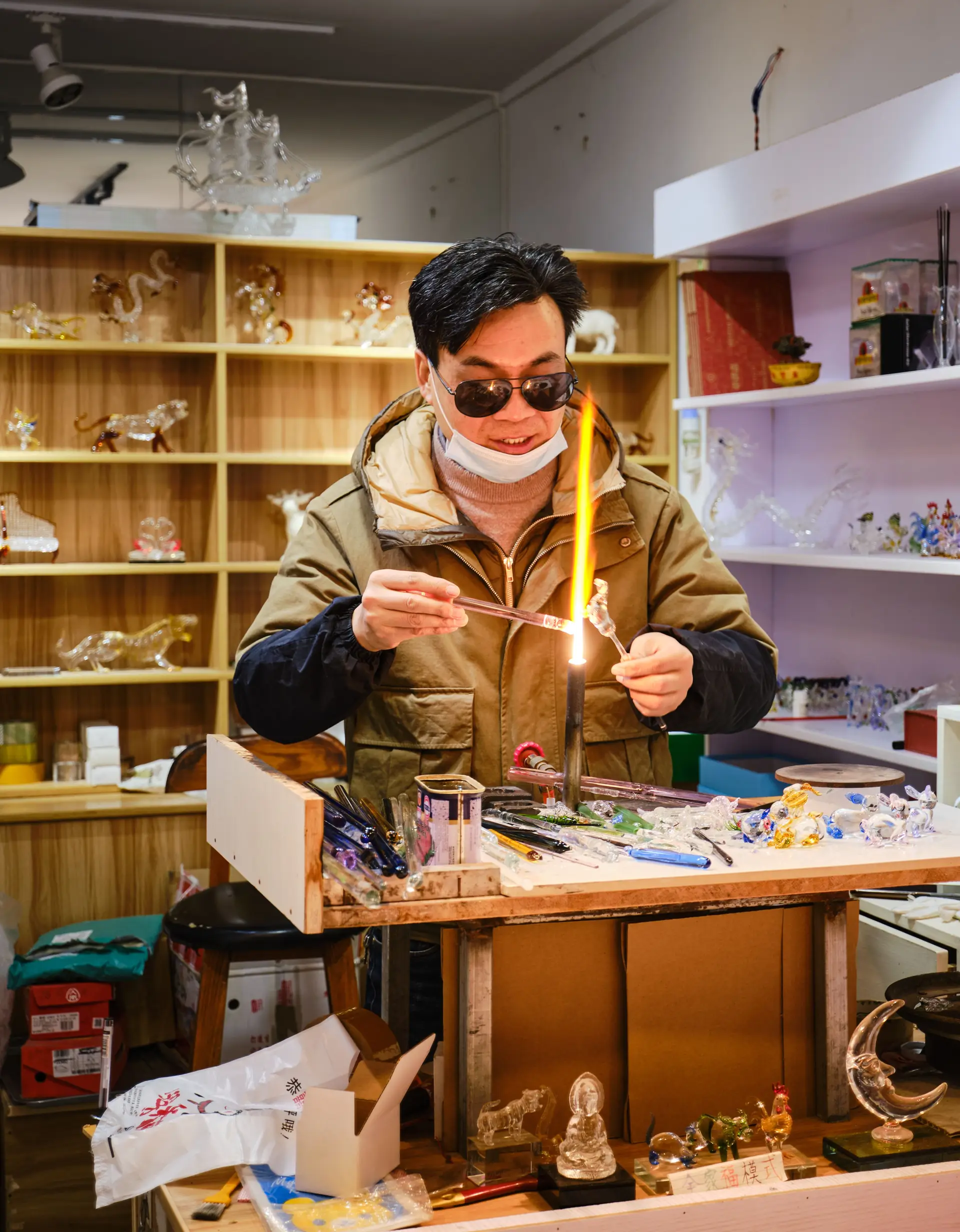 Artisan glass artist at work in the studio